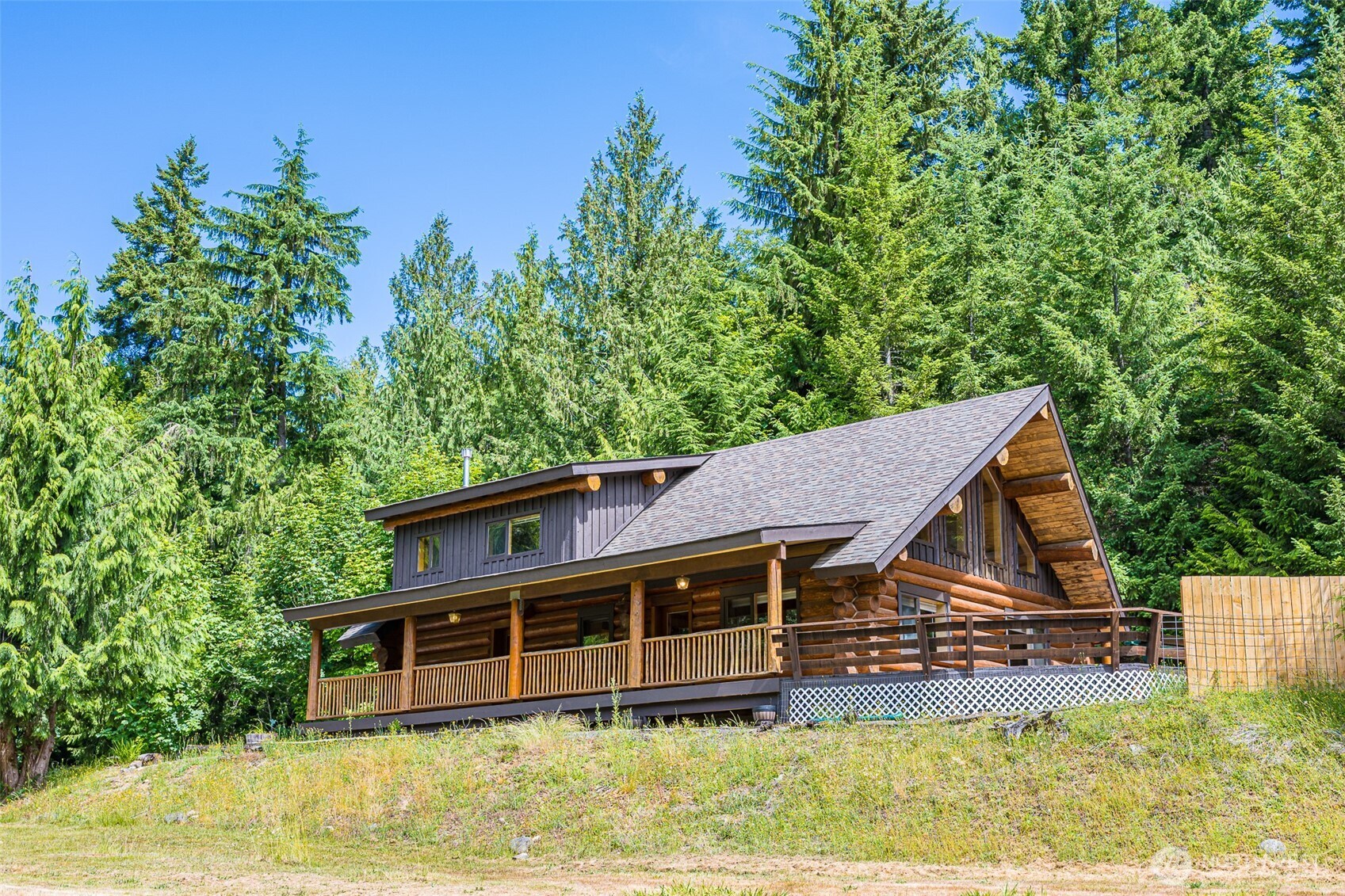 1422 Grauel-Ramapo Road Port Angeles, WA 98363 - Photo 29 of 40 a view of a house with a yard and sitting space