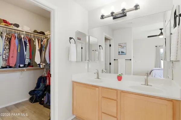 a bathroom with a double vanity sink