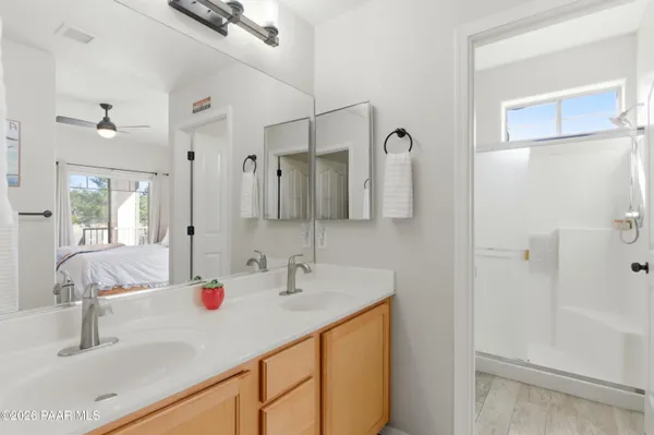 a bathroom with a sink and mirror