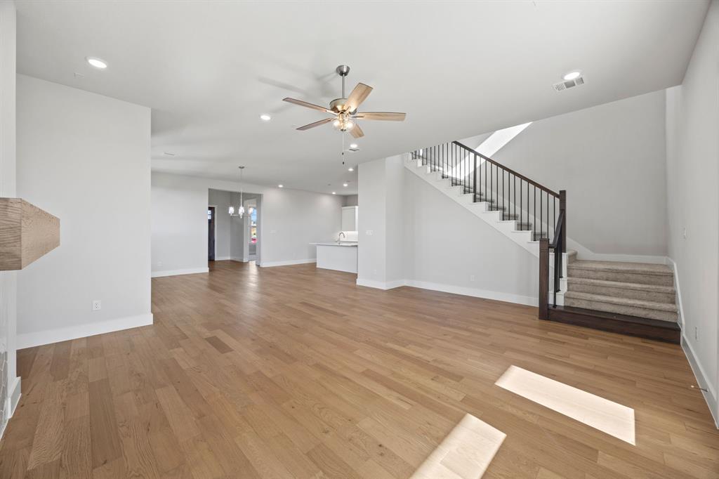 505 Callum Parkway Celina, TX 75009 - Photo 18 of 34 a view of an entryway with wooden floor