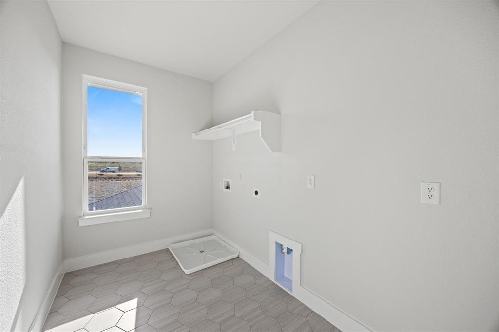 505 Callum Parkway Celina, TX 75009 - Photo 33 of 34 a view of an empty room with a window