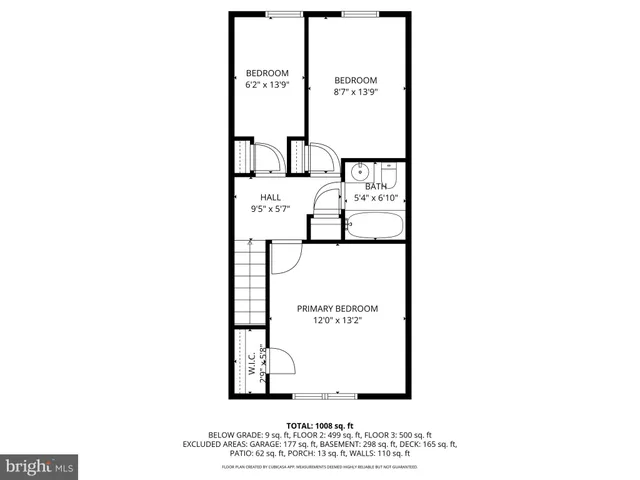 a picture of a bench in front of a wall