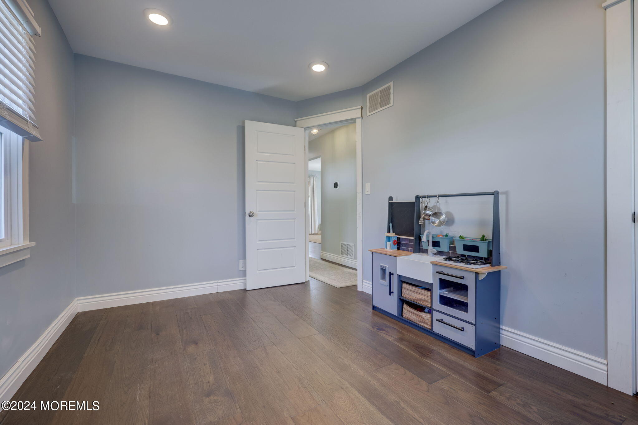 154 Ridge Avenue Belford, NJ 07718 - Photo 17 of 28 a view of a room with wooden floor
