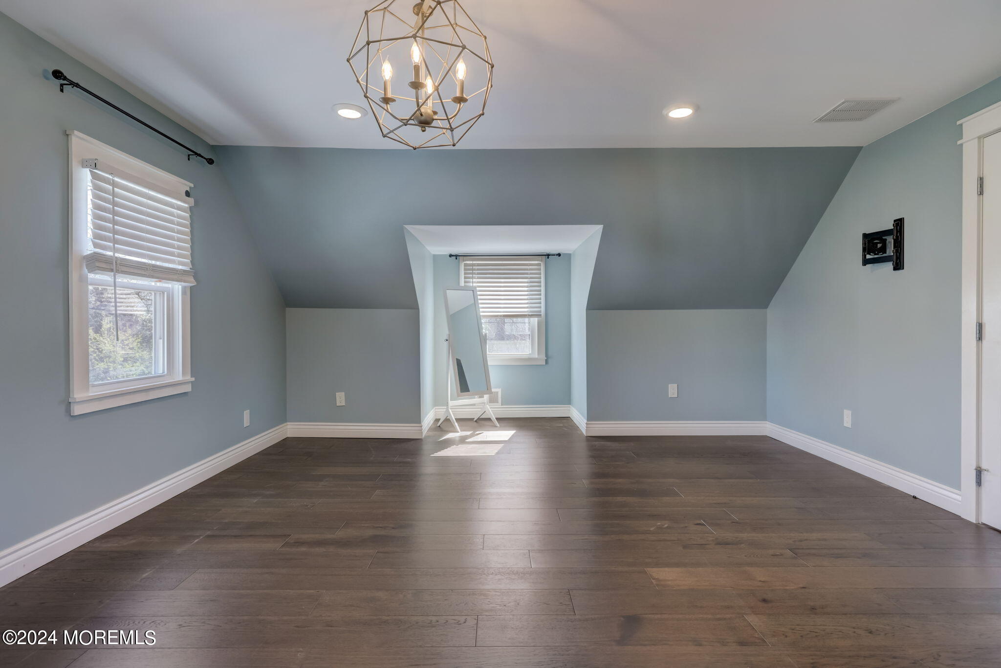 154 Ridge Avenue Belford, NJ 07718 - Photo 20 of 28 an empty room with wooden floor and windows