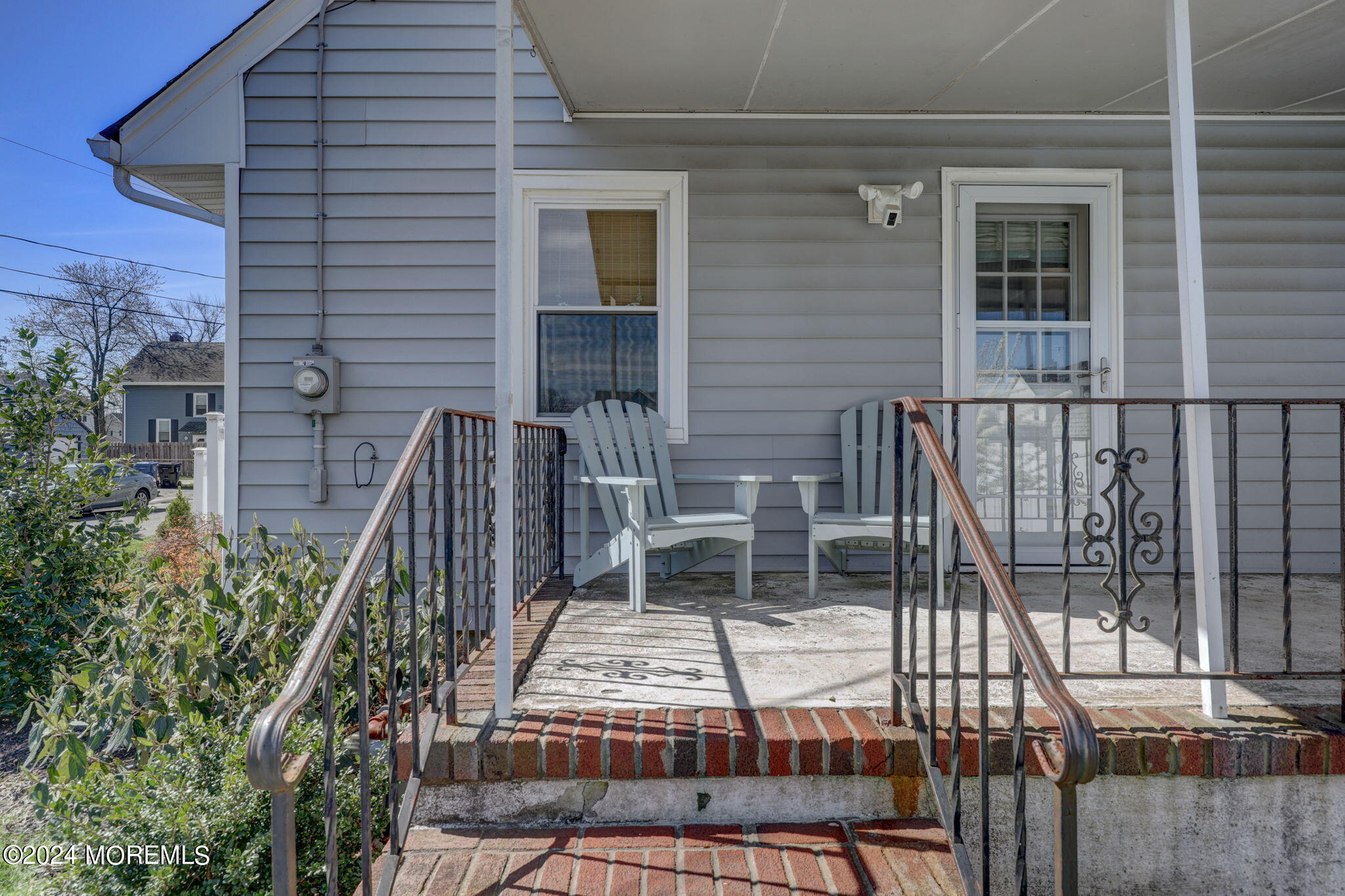 154 Ridge Avenue Belford, NJ 07718 - Photo 5 of 28 a view of balcony with wooden floor and outdoor seating