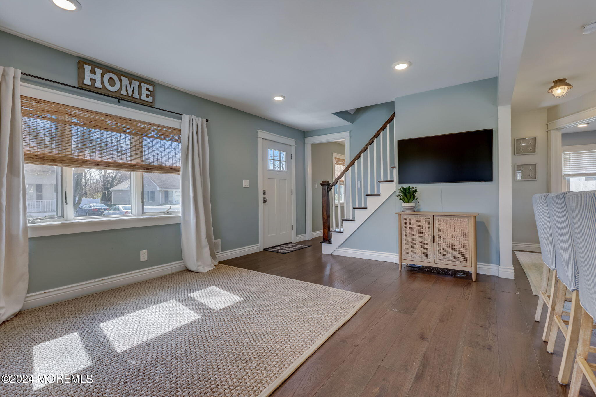 154 Ridge Avenue Belford, NJ 07718 - Photo 9 of 28 a living room with furniture and a flat screen tv