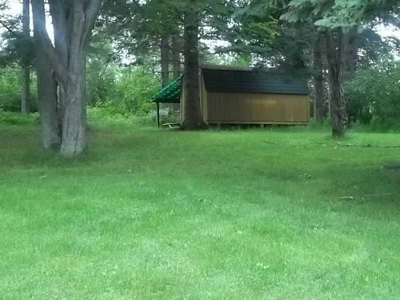 3 Furbish Road Rangeley, ME 04970 - Photo 12 of 23 Storage. Drive through storage shed