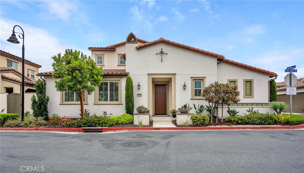 4692 Flora Park Way Cypress, CA 90720 - Photo 1 of 56 front view of a house with a yard