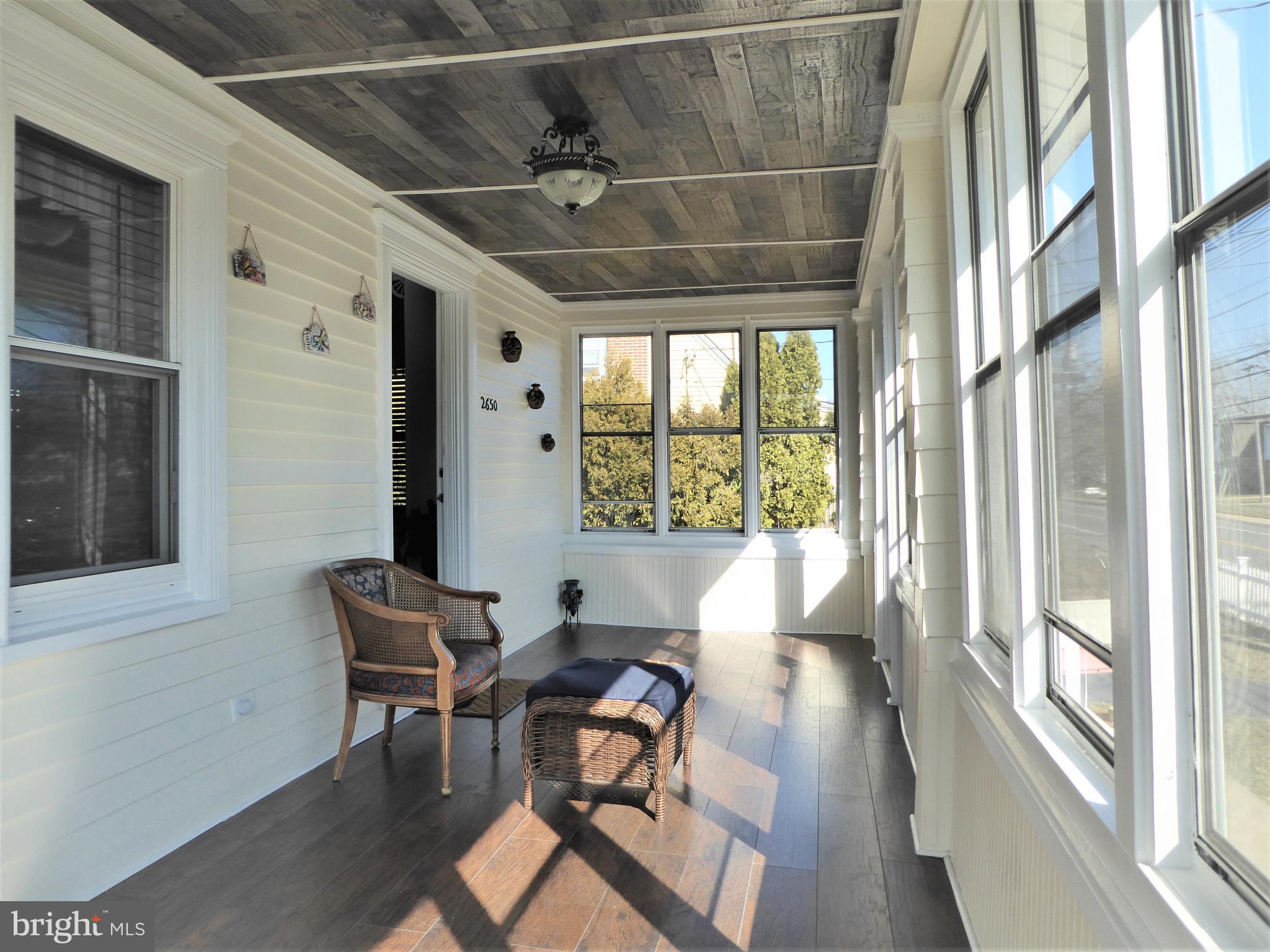 2650 Quakerbridge Road Hamilton, NJ 08619 - Photo 4 of 33 Three season front porch with wainscoting.