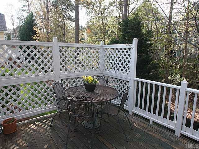 9001 Carrington Ridge Drive Raleigh, NC 27615 - Photo 14 of 17 Double Decks give plenty of room for enjoying the seasons. The trees are ready to be filled with leaves to provide a private retreat as the weather warms. Patio/Deck