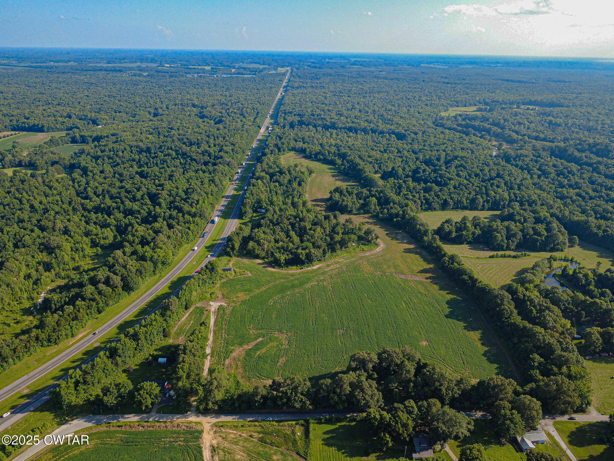 3809 Windrow Road Brownsville, TN 38012 - Photo 2 of 8 an aerial view of valley and lake