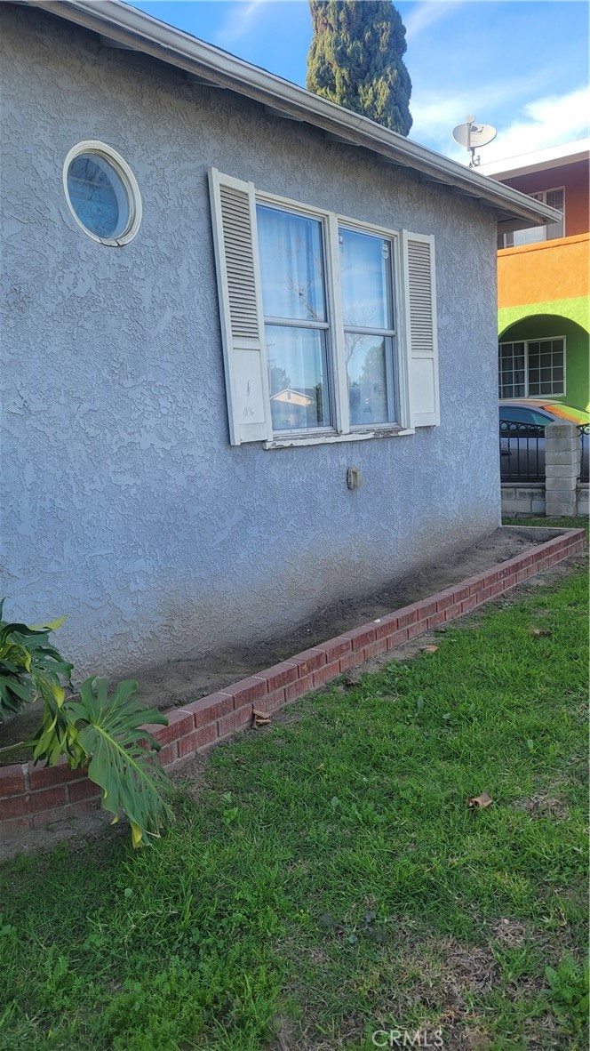 14807 South White Avenue Compton, CA 90221 - Photo 3 of 5 a backyard of a house with lots of green space