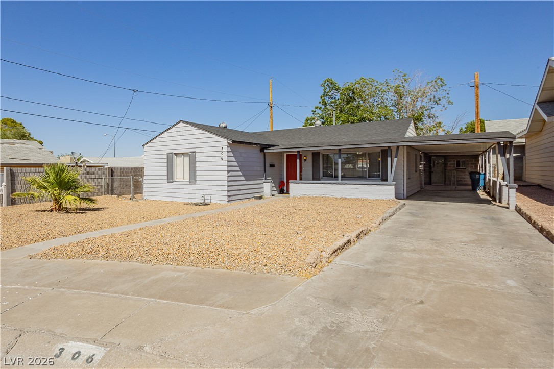306 Dell Way Henderson, NV 89015 - Photo 2 of 29 Covered Carport, Covered Front Porch with Xeriscape Landscape