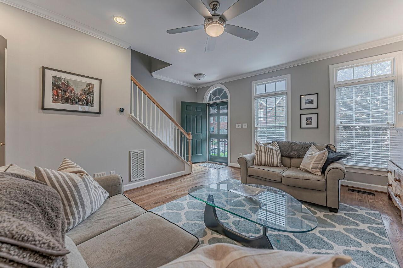 106 Hatfield Lane Raleigh, NC 27603 - Photo 3 of 29 a living room with furniture and a large window