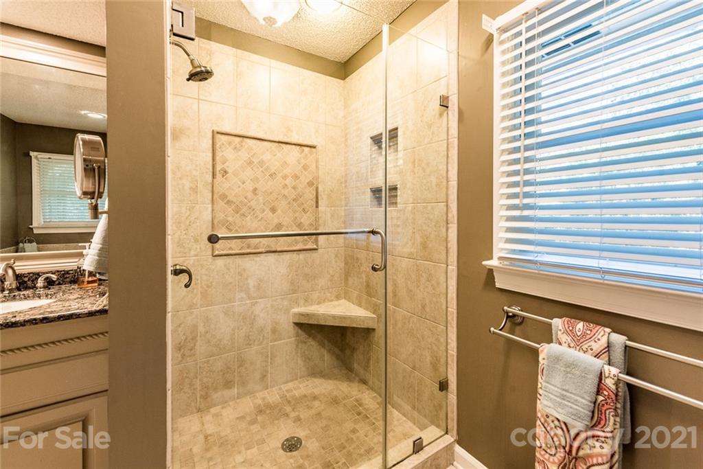 131 Friendfield Drive Fort Mill, SC 29715 - Photo 35 of 46 a bathroom with a shower and a sink