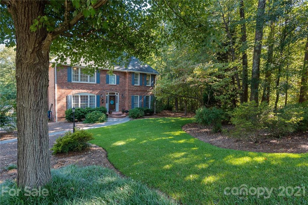 131 Friendfield Drive Fort Mill, SC 29715 - Photo 46 of 46 a front view of a house with garden