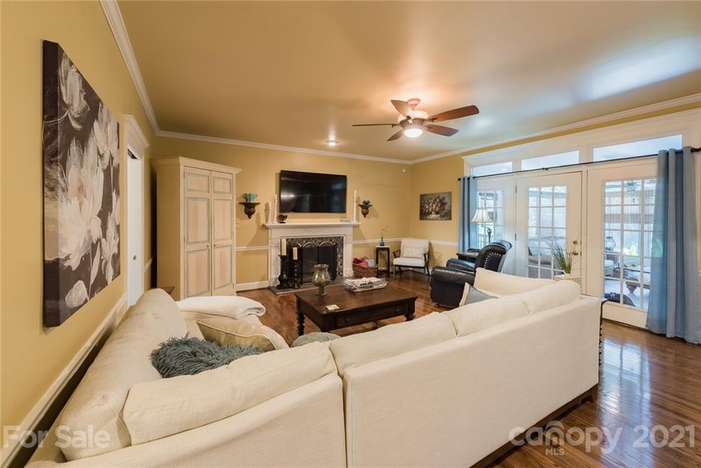 131 Friendfield Drive Fort Mill, SC 29715 - Photo 10 of 46 a living room with furniture fireplace and a flat screen tv