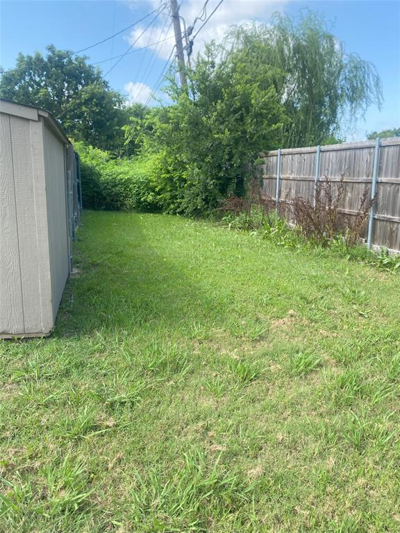 400 South 2nd Street Wylie, TX 75098 - Photo 19 of 22 a view of a backyard with a plants and trees