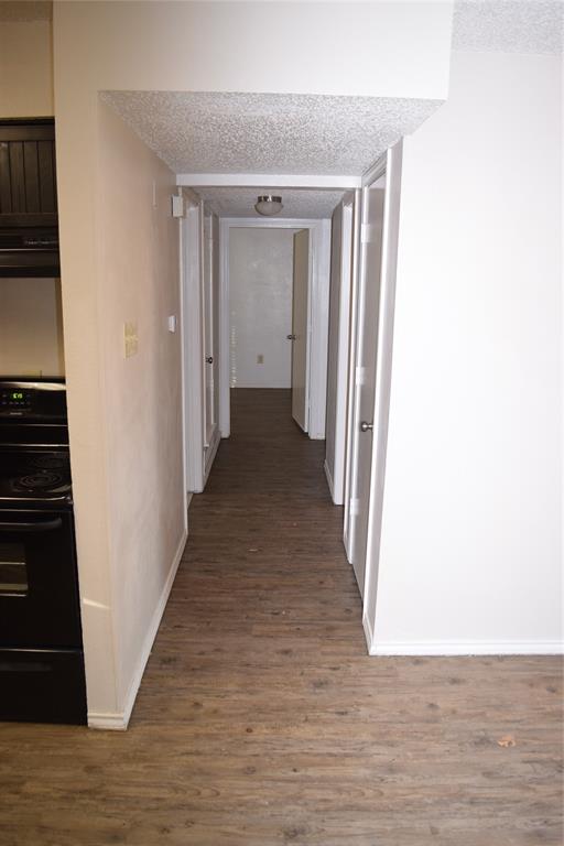 400 South 2nd Street Wylie, TX 75098 - Photo 5 of 22 a view of a hallway with wooden floor