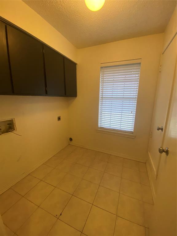 400 South 2nd Street Wylie, TX 75098 - Photo 7 of 22 a view of an empty room with a window