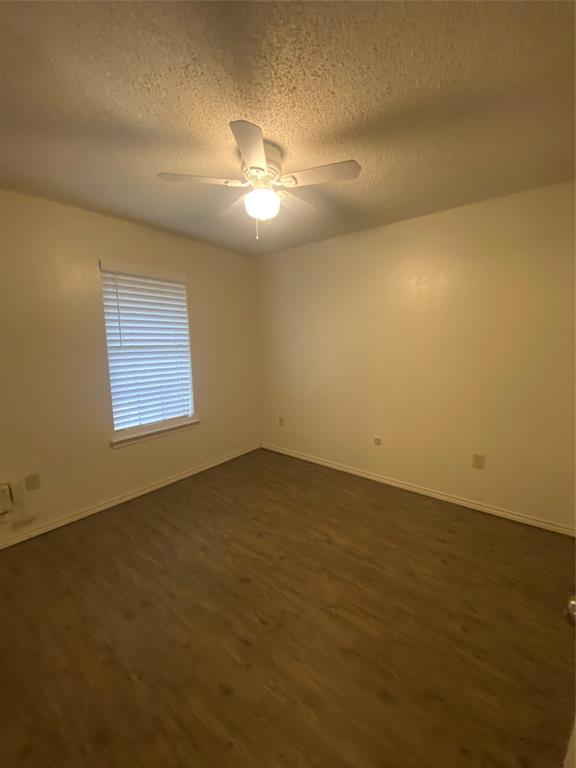 400 South 2nd Street Wylie, TX 75098 - Photo 10 of 22 an empty room with a empty space and a window