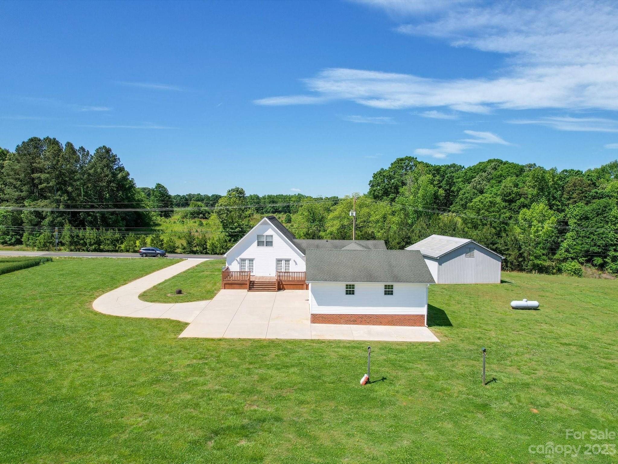 1004 Austin Chaney Road Wingate, NC 28174 - Photo 3 of 48 a view of a house with a yard