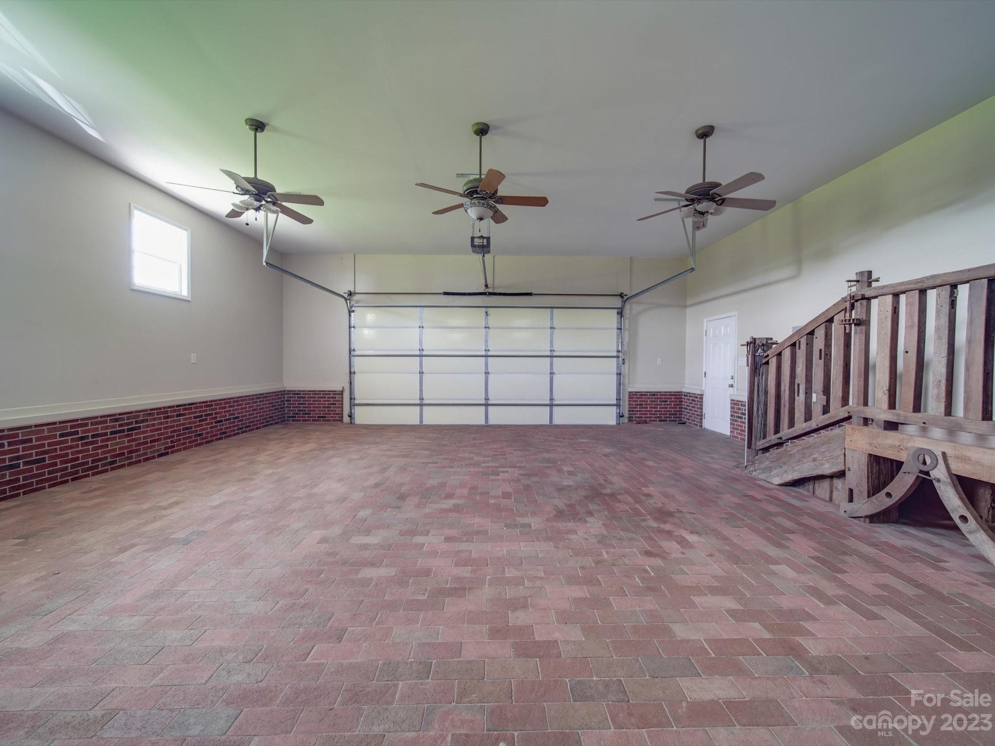 1004 Austin Chaney Road Wingate, NC 28174 - Photo 45 of 48 a view of a livingroom with furniture and chandelier fan