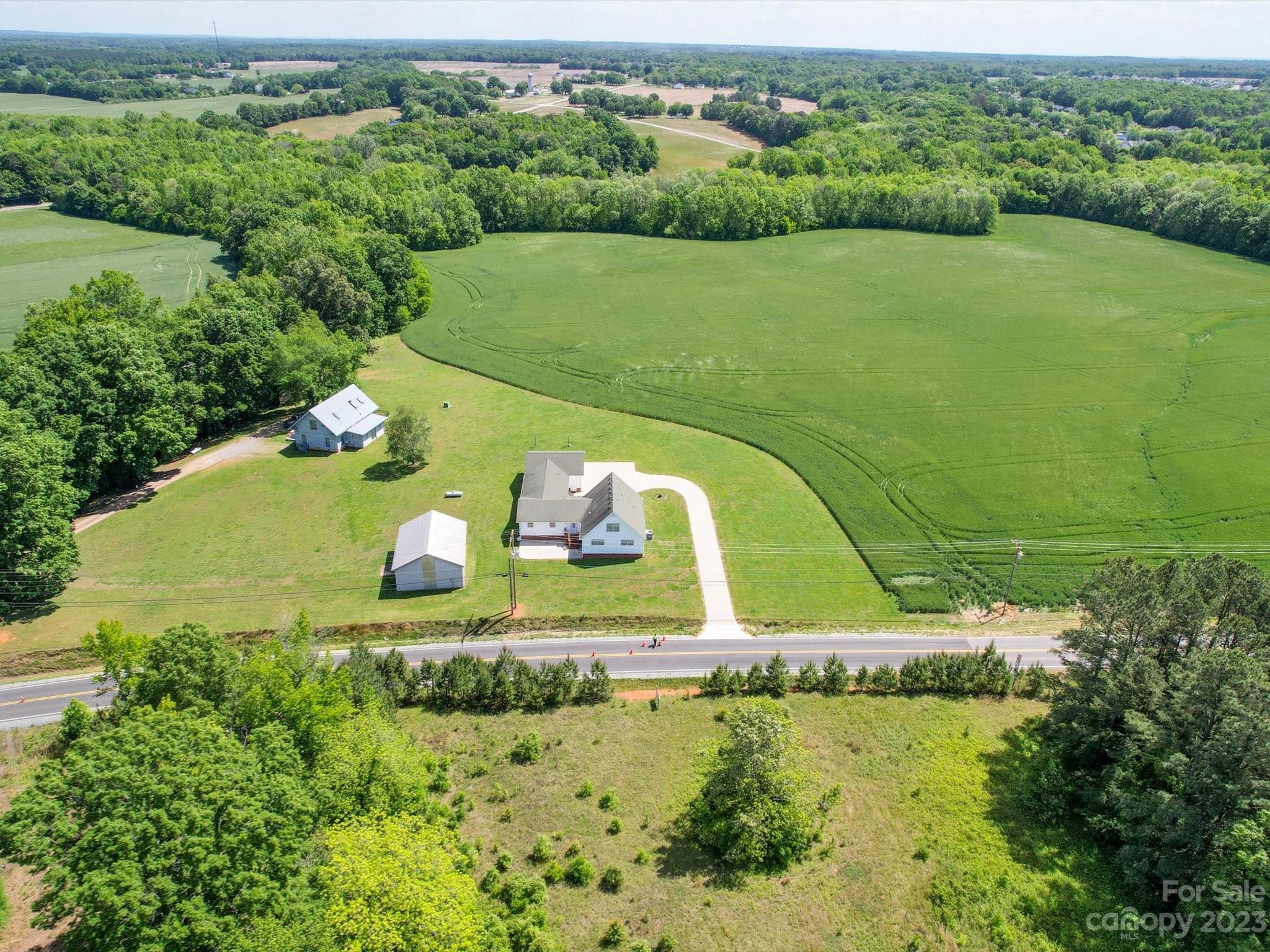 1004 Austin Chaney Road Wingate, NC 28174 - Photo 5 of 48 an aerial view of a houses with a yard