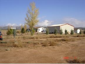 1475 West Antelope Run Road Paulden, AZ 86334 - Photo 5 of 5 a view of a yard with a house
