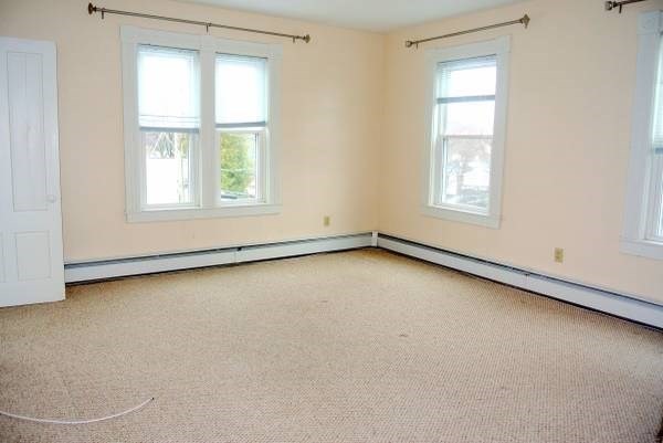 21 Maple Street Clinton, MA 01510 - Photo 14 of 17 an empty room with a window