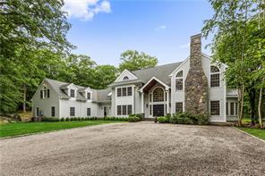 29 Spring House Road Pound Ridge, NY 10576 - Photo 1 of 1 a front view of a house with a garden