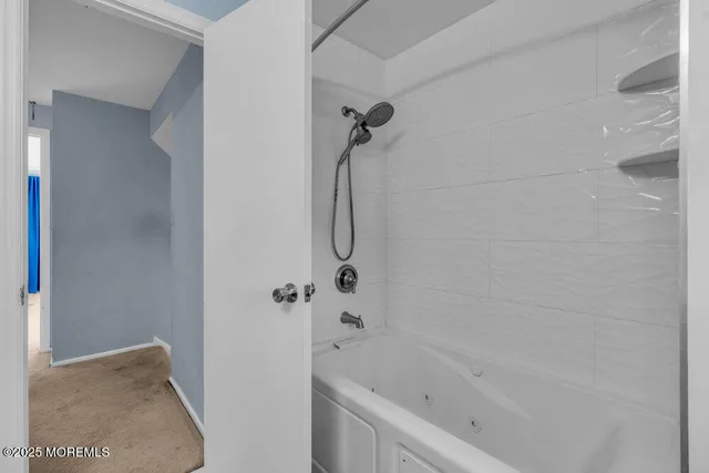 a bathroom with a bathtub