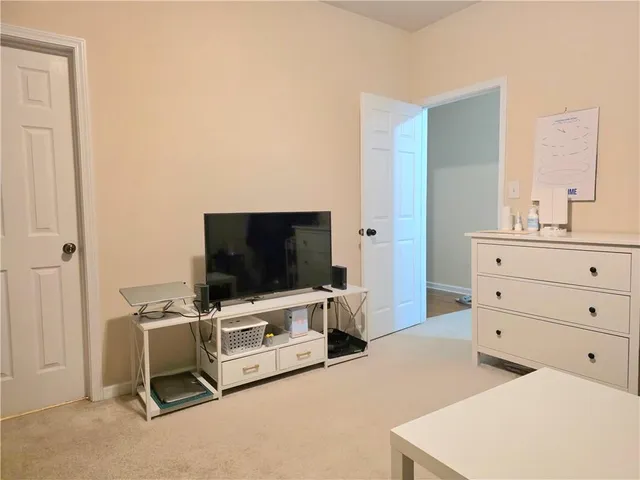 a room with furniture and tv