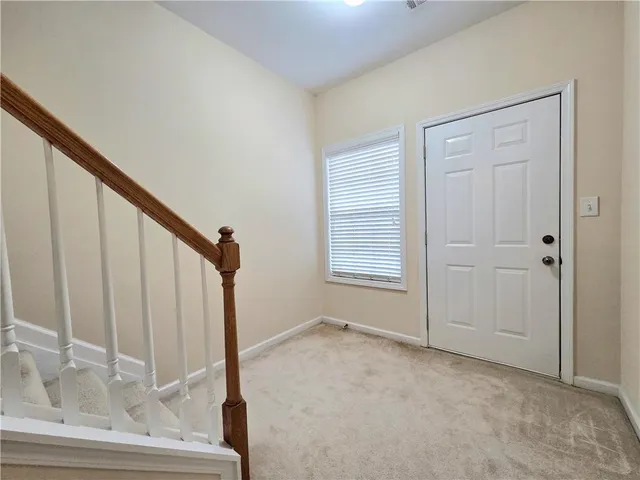 a view of an entryway with staircase