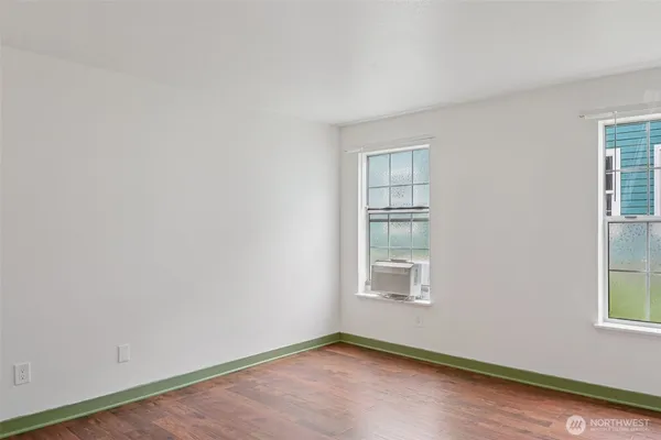 an empty room with windows