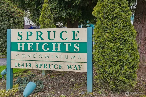 a sign broad on the side of the road