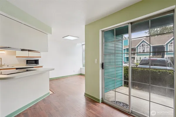 a kitchen with stainless steel appliances a stove and a refrigerator