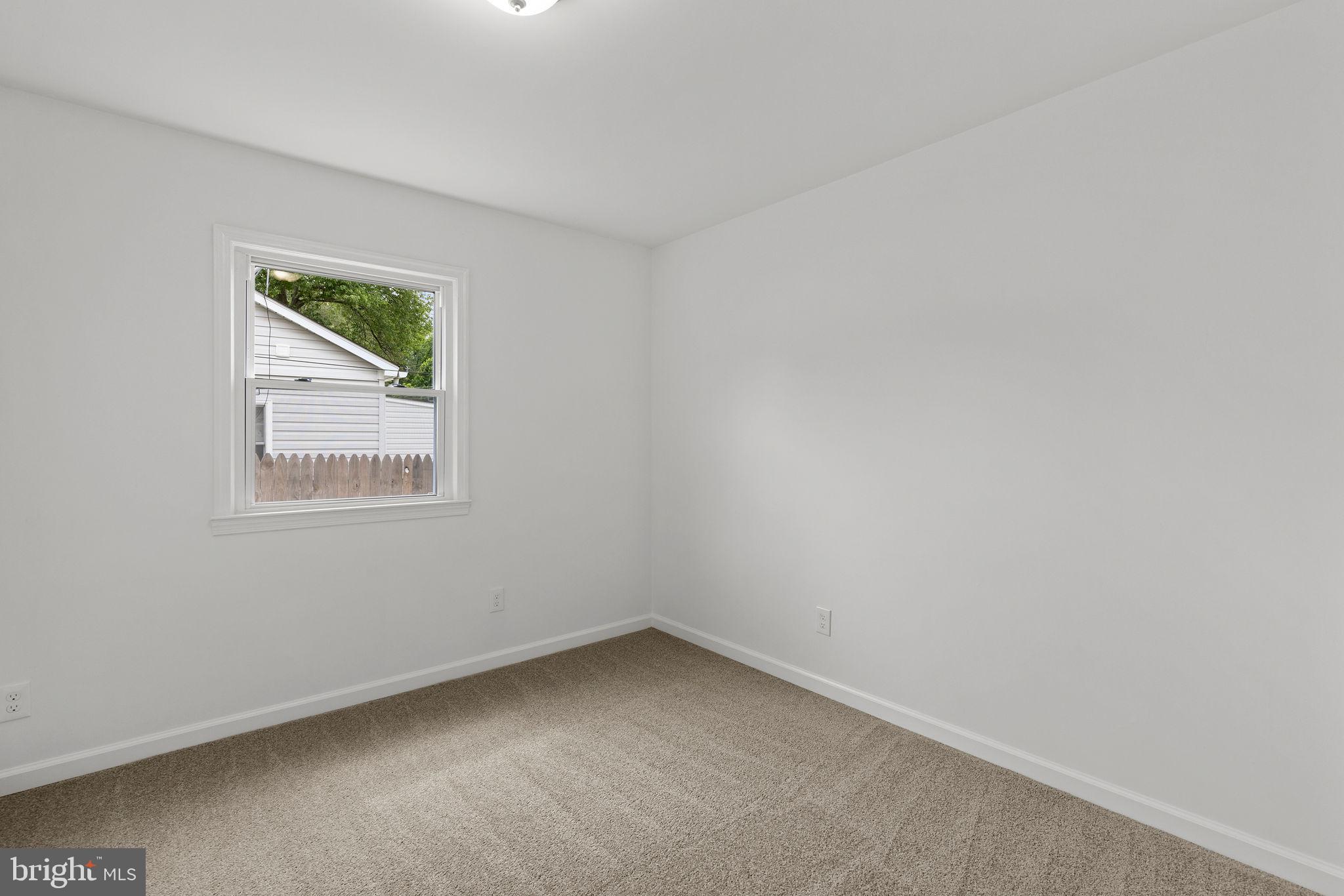 554 Compass Road East Baltimore, MD 21220 - Photo 14 of 24 an empty room with a window