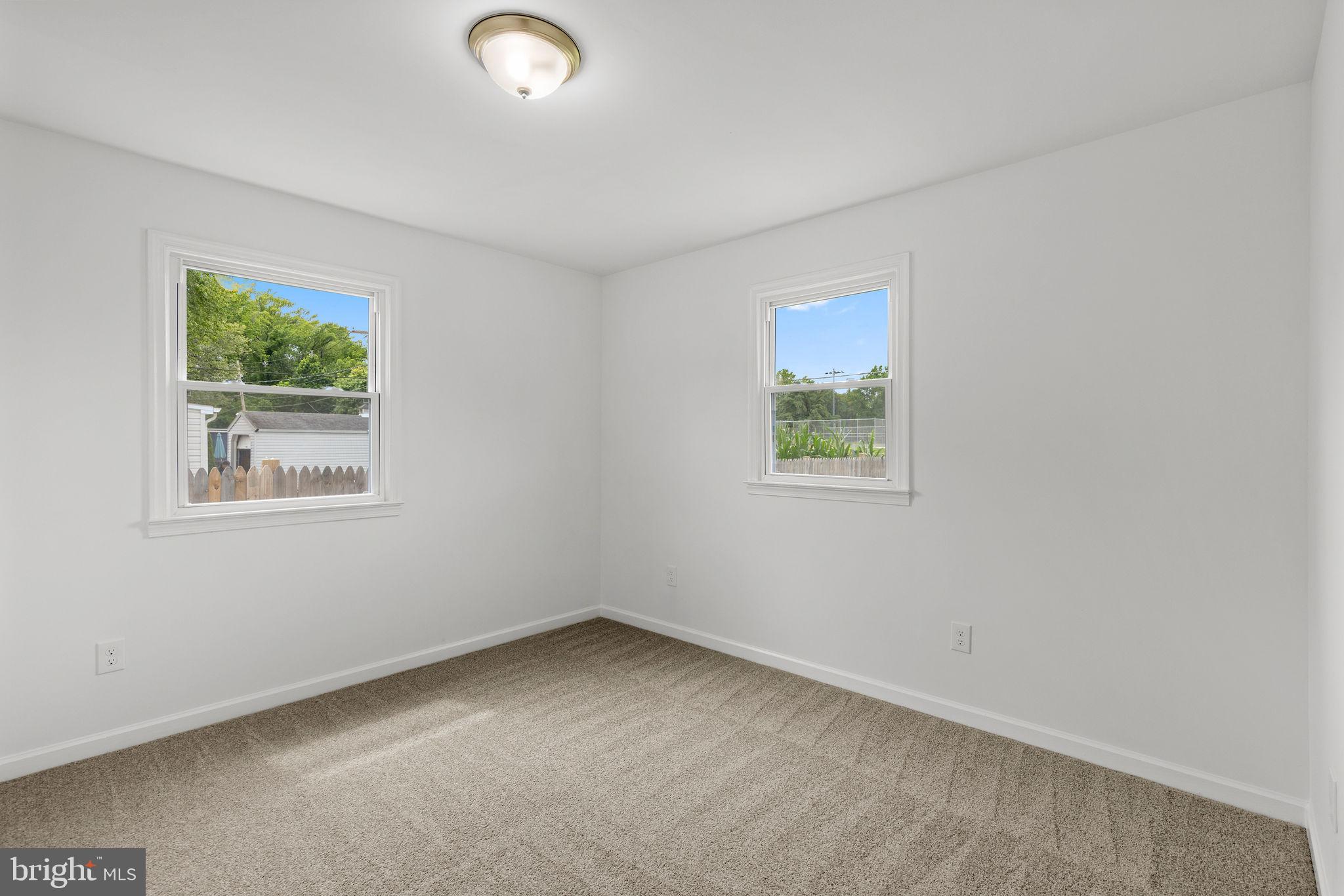 554 Compass Road East Baltimore, MD 21220 - Photo 16 of 24 an empty room with a window