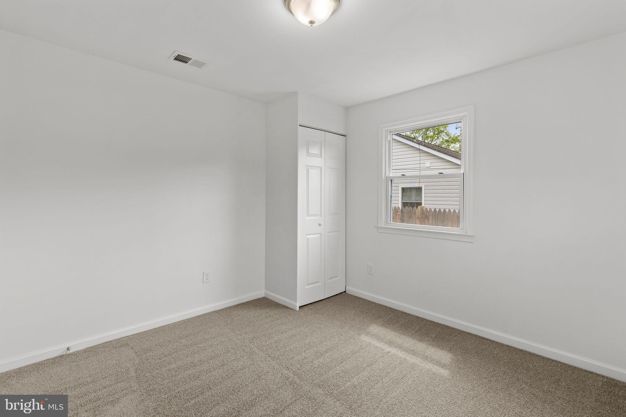 554 Compass Road East Baltimore, MD 21220 - Photo 17 of 24 an empty room with a window
