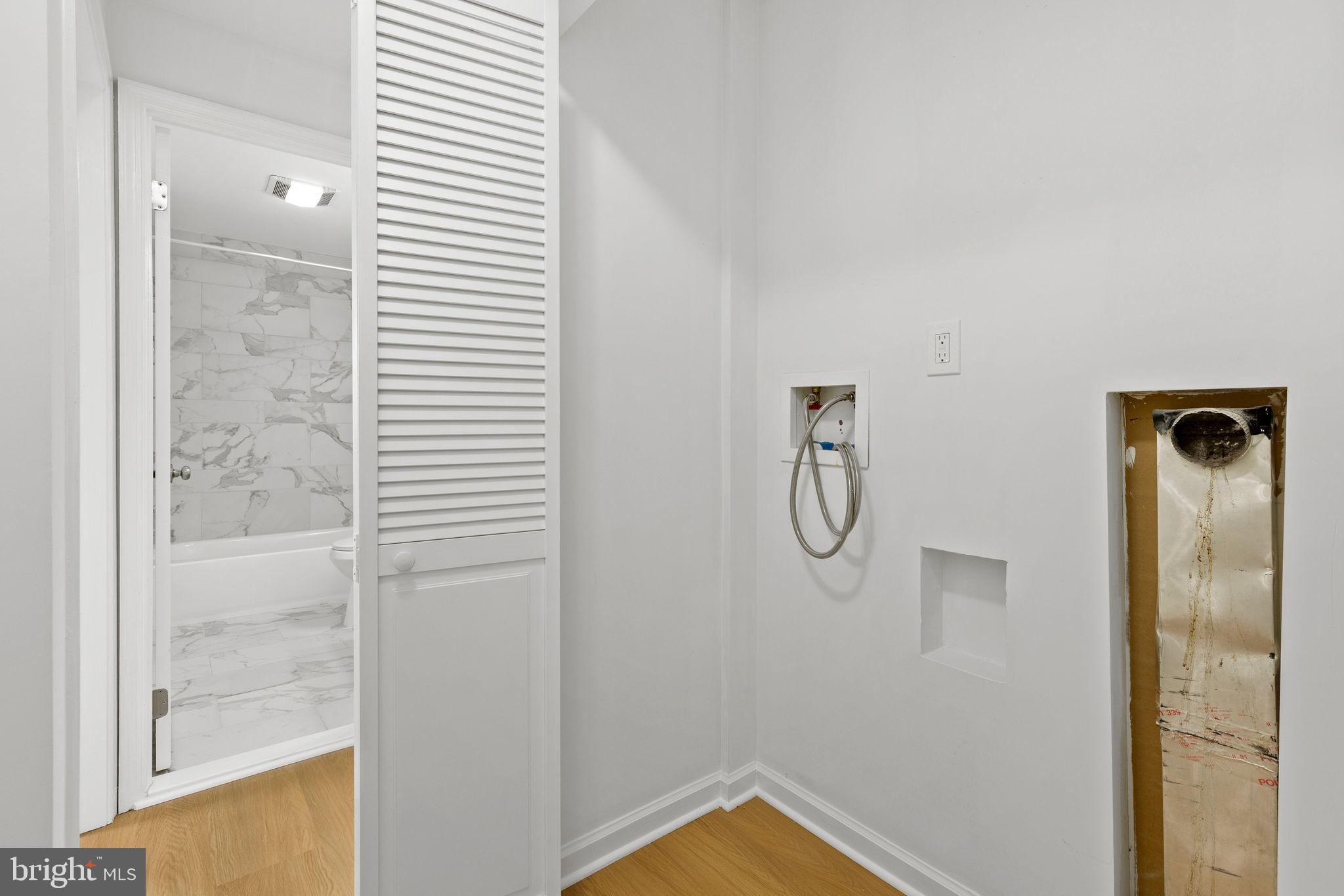 554 Compass Road East Baltimore, MD 21220 - Photo 20 of 24 a bathroom with a glass shower door