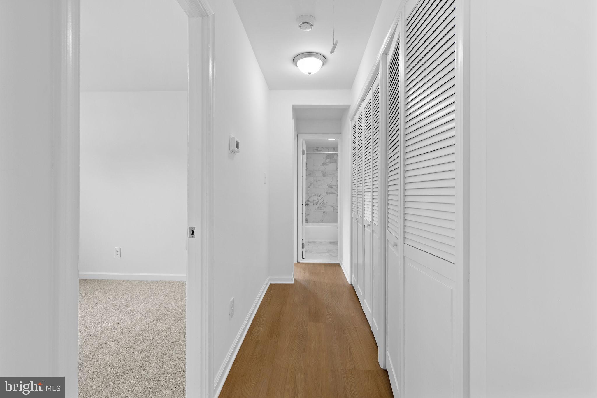 554 Compass Road East Baltimore, MD 21220 - Photo 21 of 24 a view of a hallway with a white walls