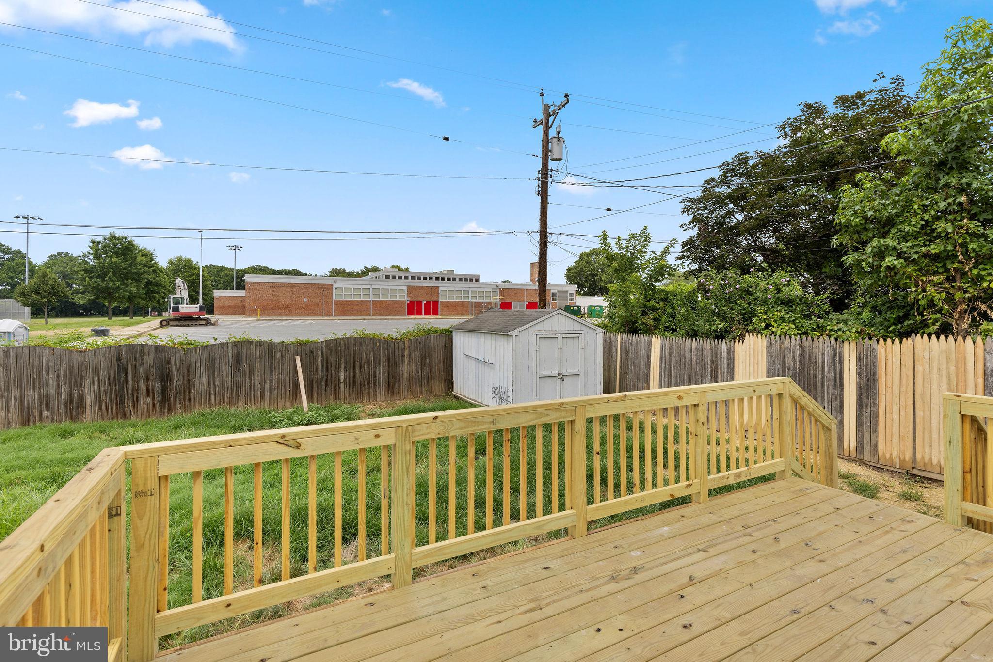 554 Compass Road East Baltimore, MD 21220 - Photo 23 of 24 a view of a deck with a yard