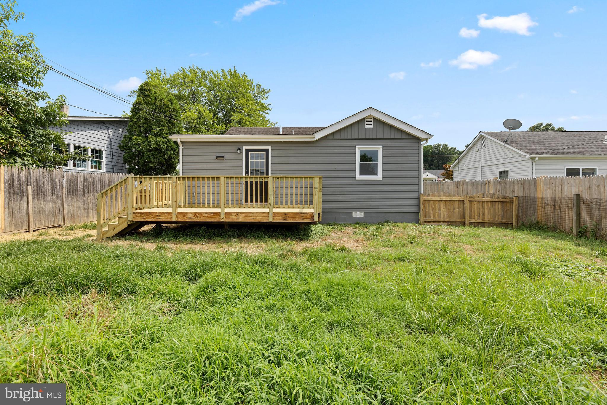 554 Compass Road East Baltimore, MD 21220 - Photo 24 of 24 a view of a house with a yard
