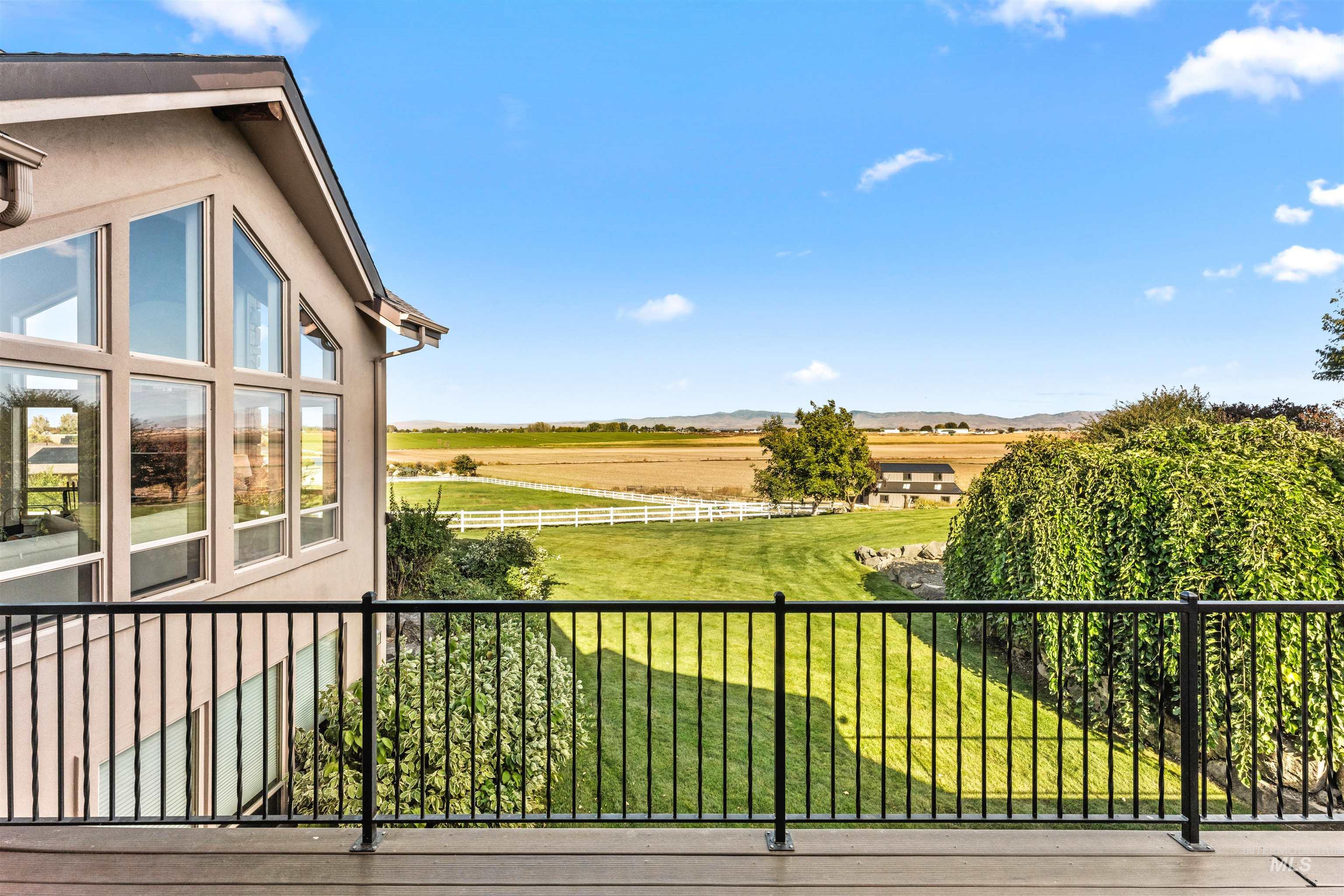 4262 South Rustler Lane Meridian, ID 83642 - Photo 44 of 50 Balcony featuring a view of rural / pastoral area and a mountain view