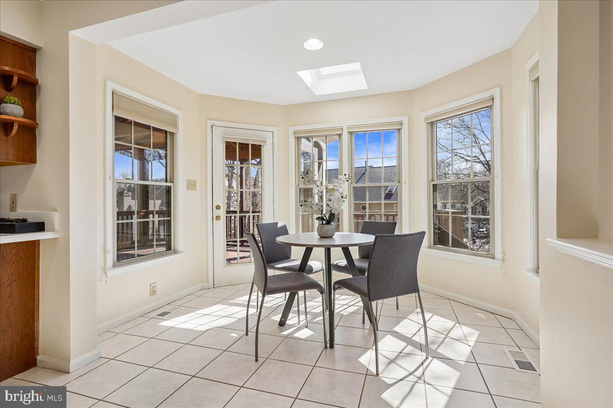 8501 Silverview Drive Lorton, VA 22079 - Photo 14 of 72 a dining room with furniture and window