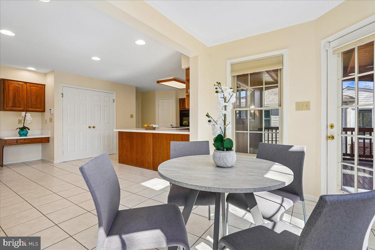 8501 Silverview Drive Lorton, VA 22079 - Photo 15 of 72 a view of a dining room with furniture