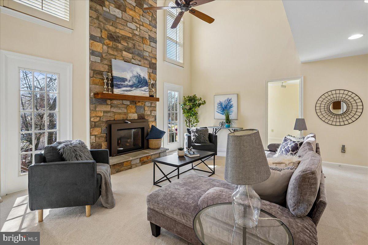 8501 Silverview Drive Lorton, VA 22079 - Photo 16 of 72 a living room with furniture and a fireplace