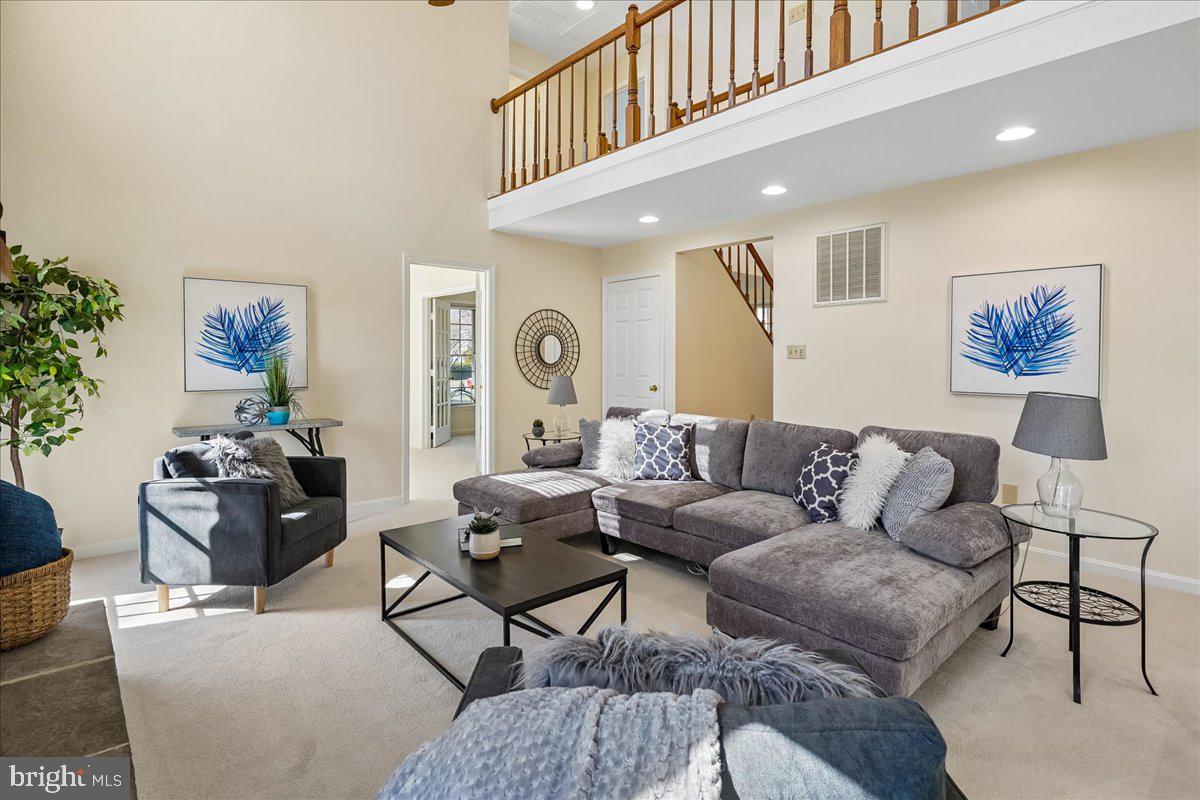 8501 Silverview Drive Lorton, VA 22079 - Photo 19 of 72 a living room with furniture a rug and a window