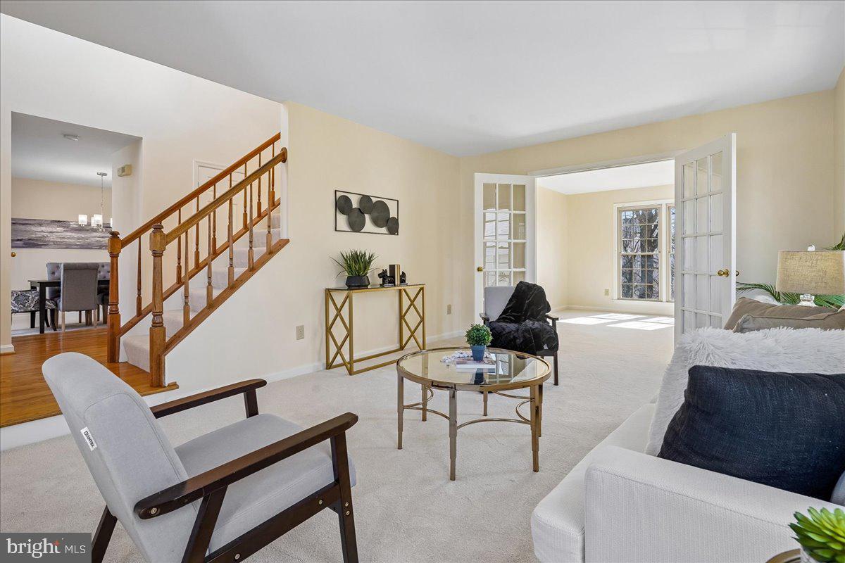8501 Silverview Drive Lorton, VA 22079 - Photo 22 of 72 a living room with furniture and a wooden floor